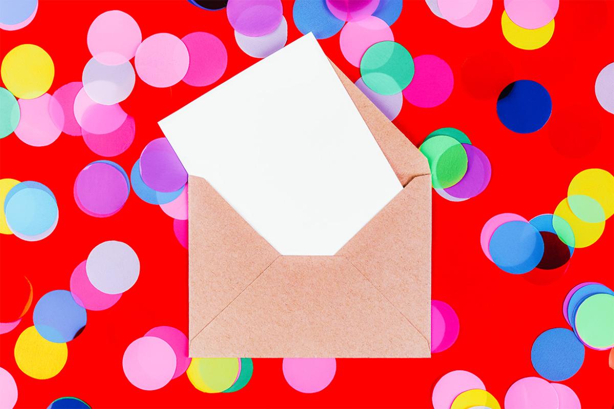 Envelope surrounded by brightly colored circles
